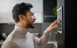man adjusting temperature